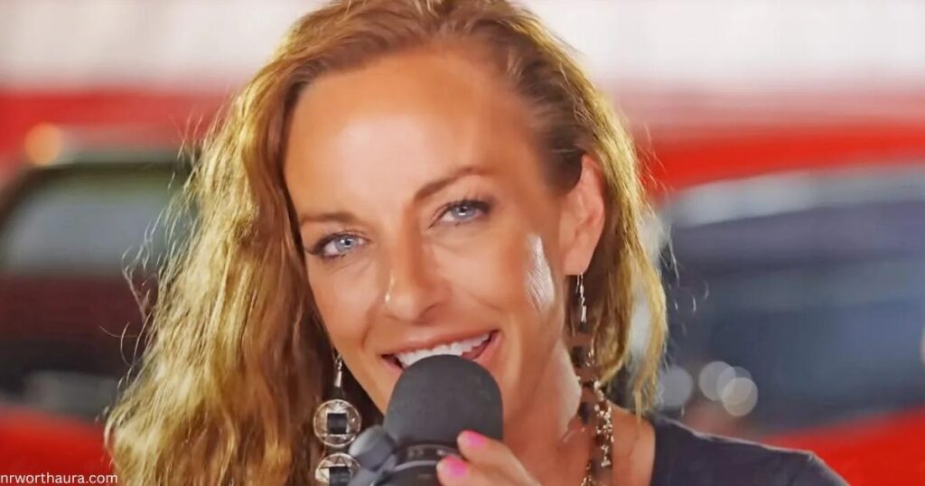 Tayla Lynn performing live on stage with country music vibe.