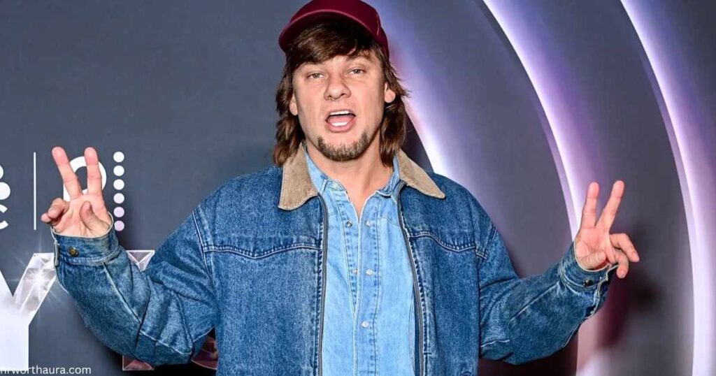 Theo Von performing live on stage in 2026.