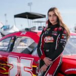 Toni Breidinger in NASCAR racing suit at a 2026 event.